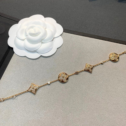 [AM]STAR AND SUN 4 MOTIFS GOLD DIAMONDS BRACELET