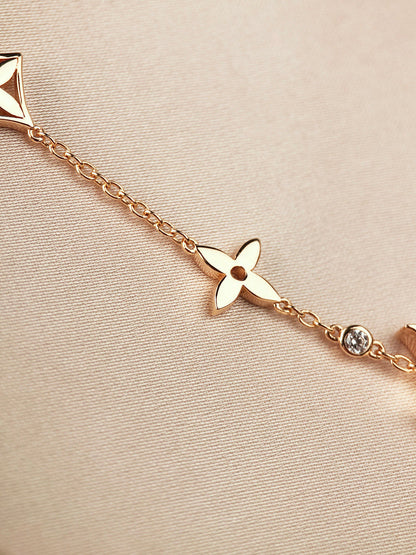 [AM]STAR AND SUN 7 MOTIFS GOLD BRACELET