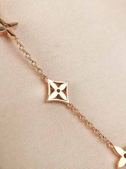 [AM]STAR AND SUN 7 MOTIFS GOLD BRACELET