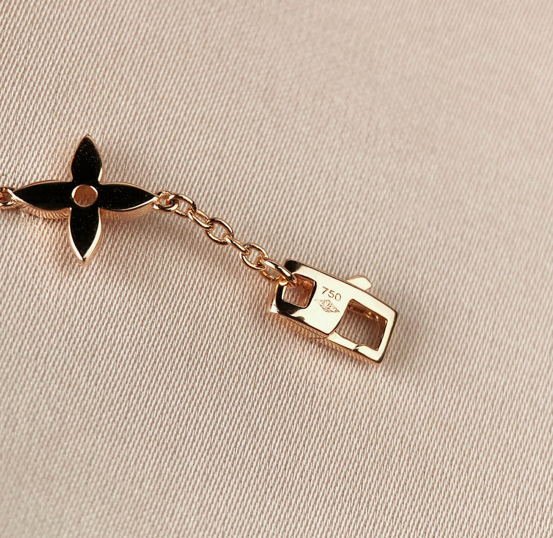 [AM]STAR AND SUN 7 MOTIFS GOLD BRACELET