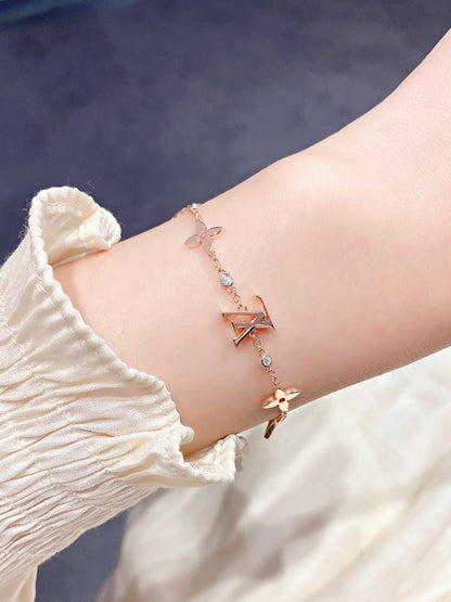 [AM]STAR AND SUN 7 MOTIFS GOLD BRACELET