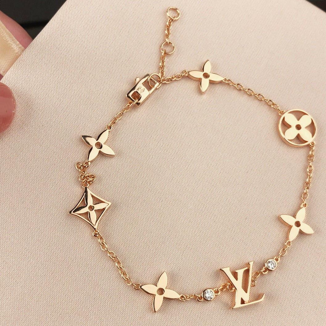 [AM]STAR AND SUN 7 MOTIFS GOLD BRACELET