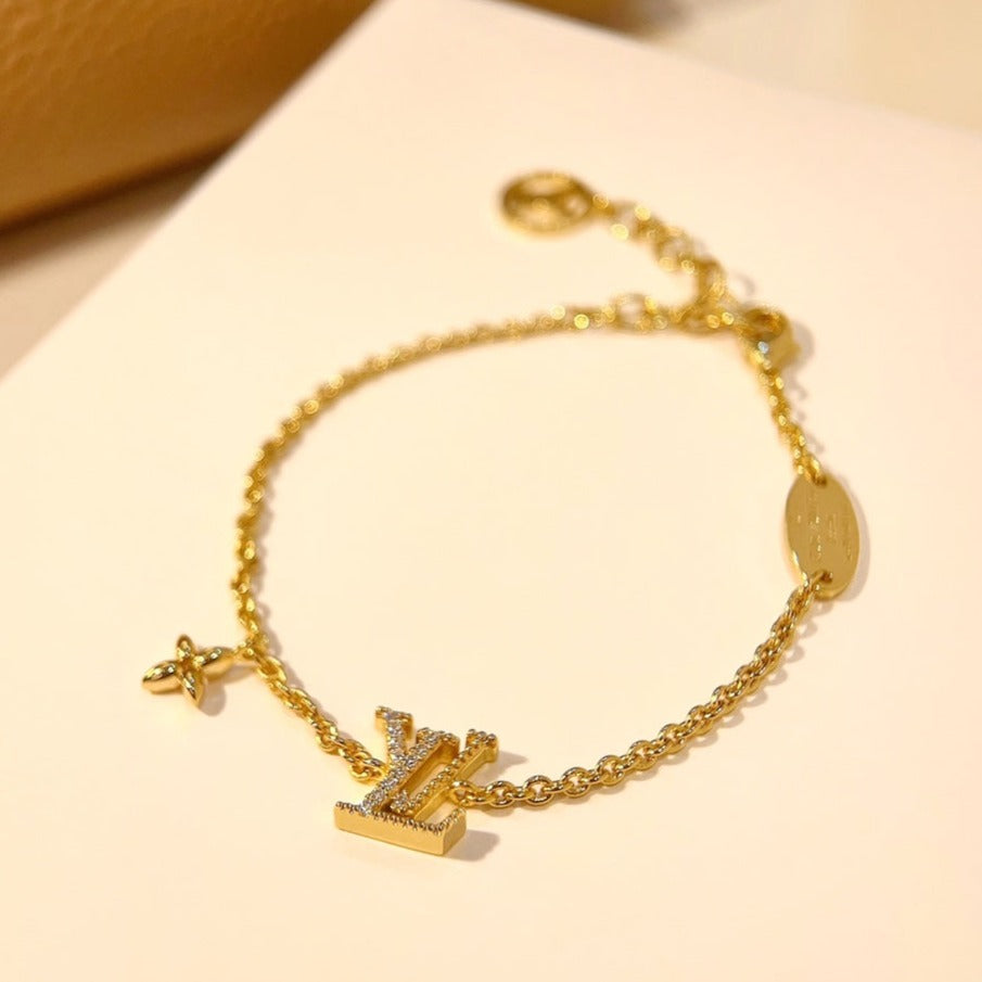 [AM]LOGO STAR MOTIF GOLD BRACELET