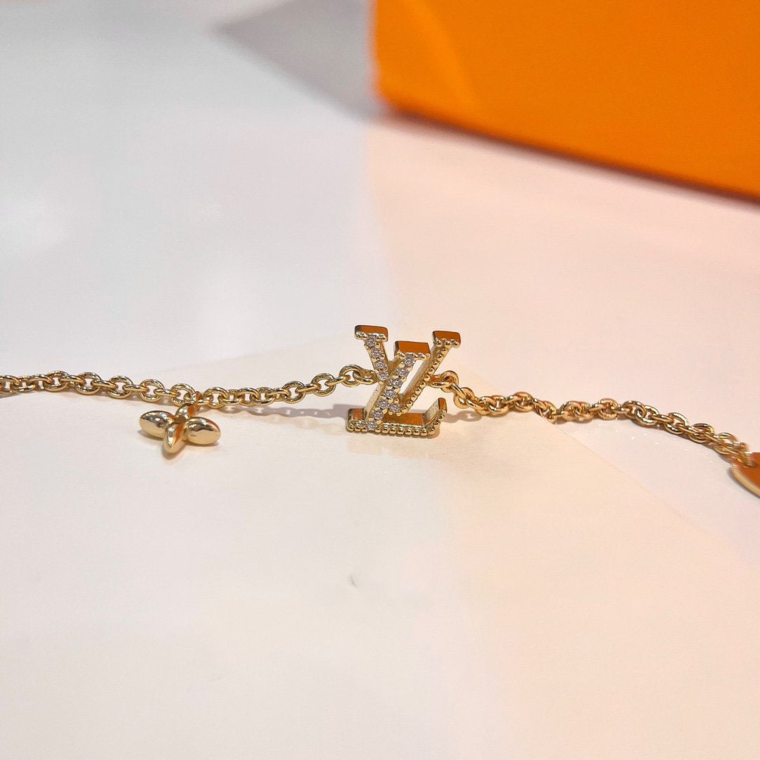 [AM]LOGO STAR MOTIF GOLD BRACELET