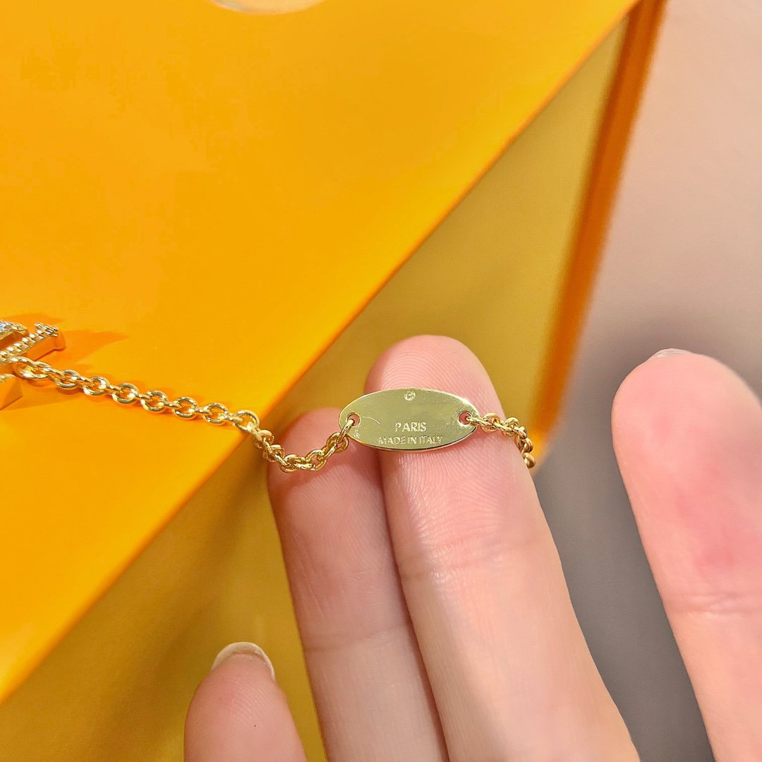 [AM]LOGO STAR MOTIF GOLD BRACELET