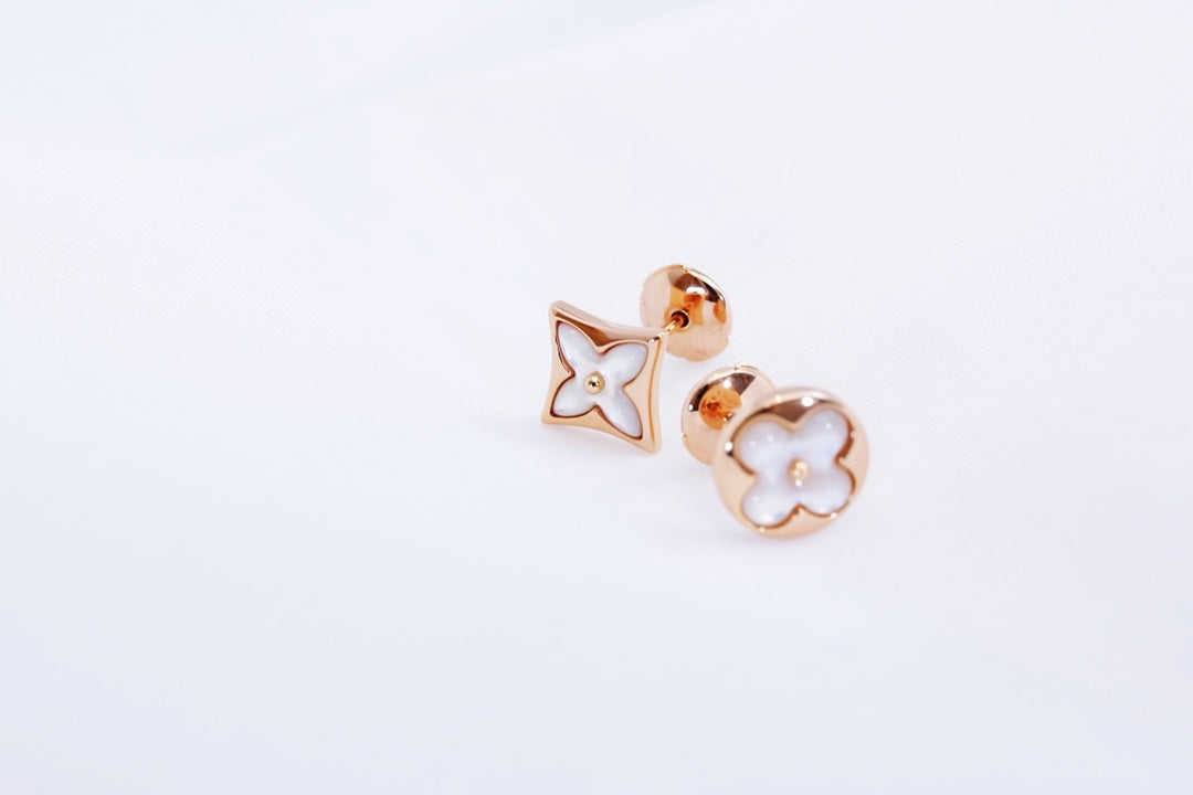 [AM]STAR AND SUN ROSE GOLD MOP STUD EARRINGS