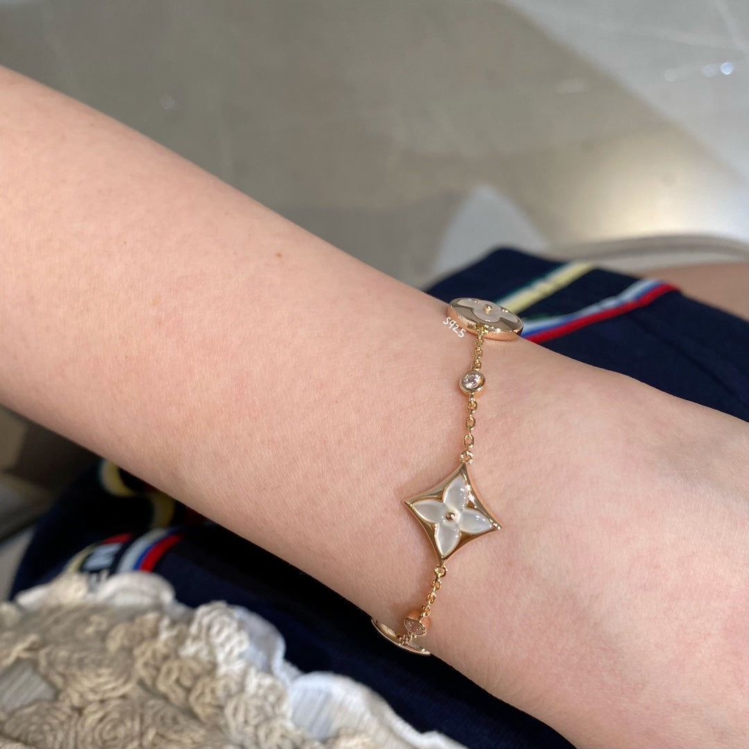 [AM]STAR AND SUN 4 MOTIF WHITE MOP ROSE GOLD BRACELET