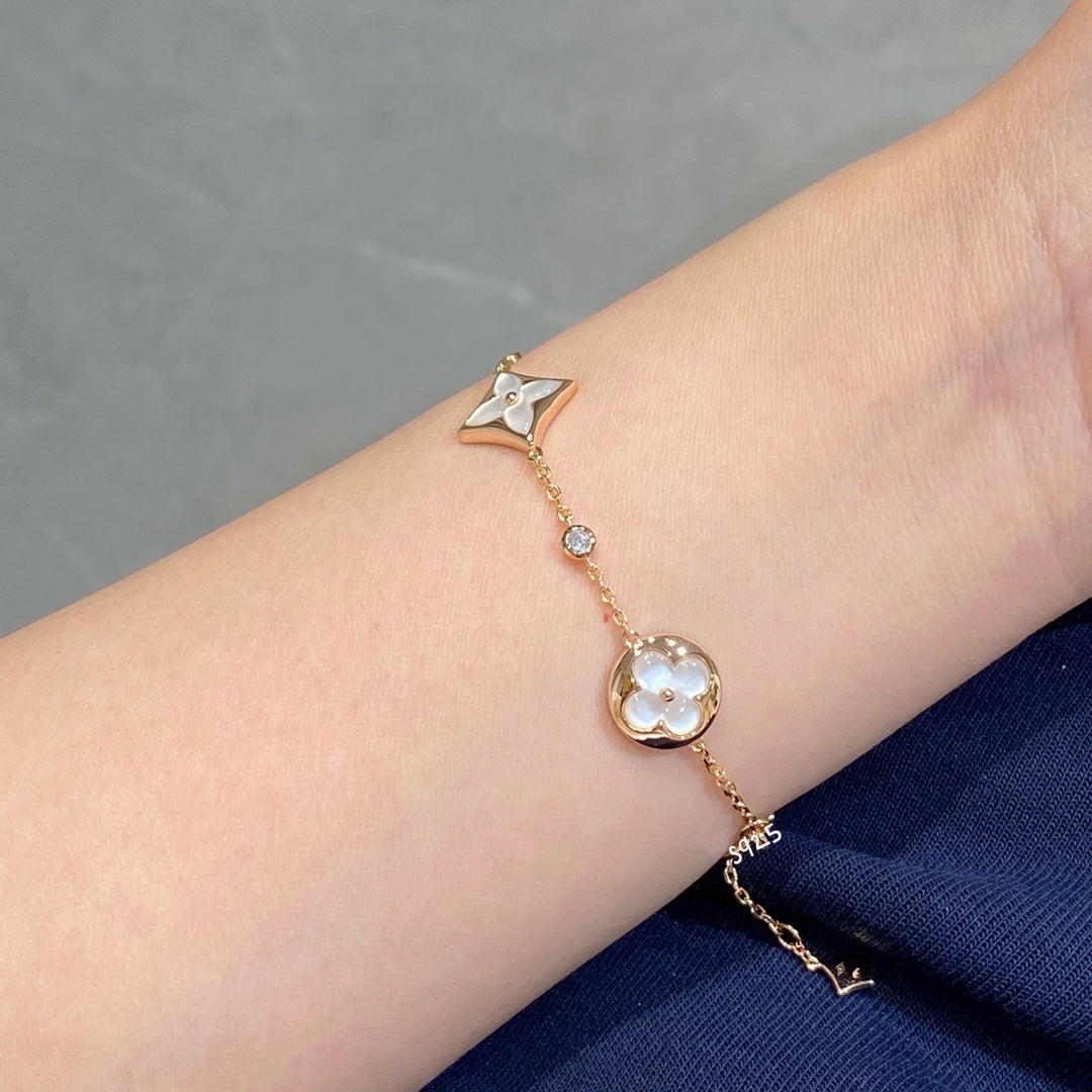 [AM]STAR AND SUN 4 MOTIF WHITE MOP ROSE GOLD BRACELET