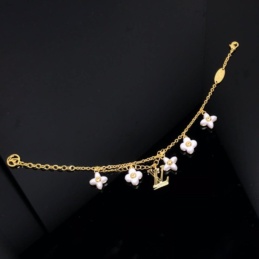 [AM]LOGO 6 MOTIF STAR AND SUN GOLD BRACELET