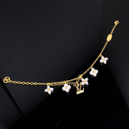 [AM]LOGO 6 MOTIF STAR AND SUN GOLD BRACELET