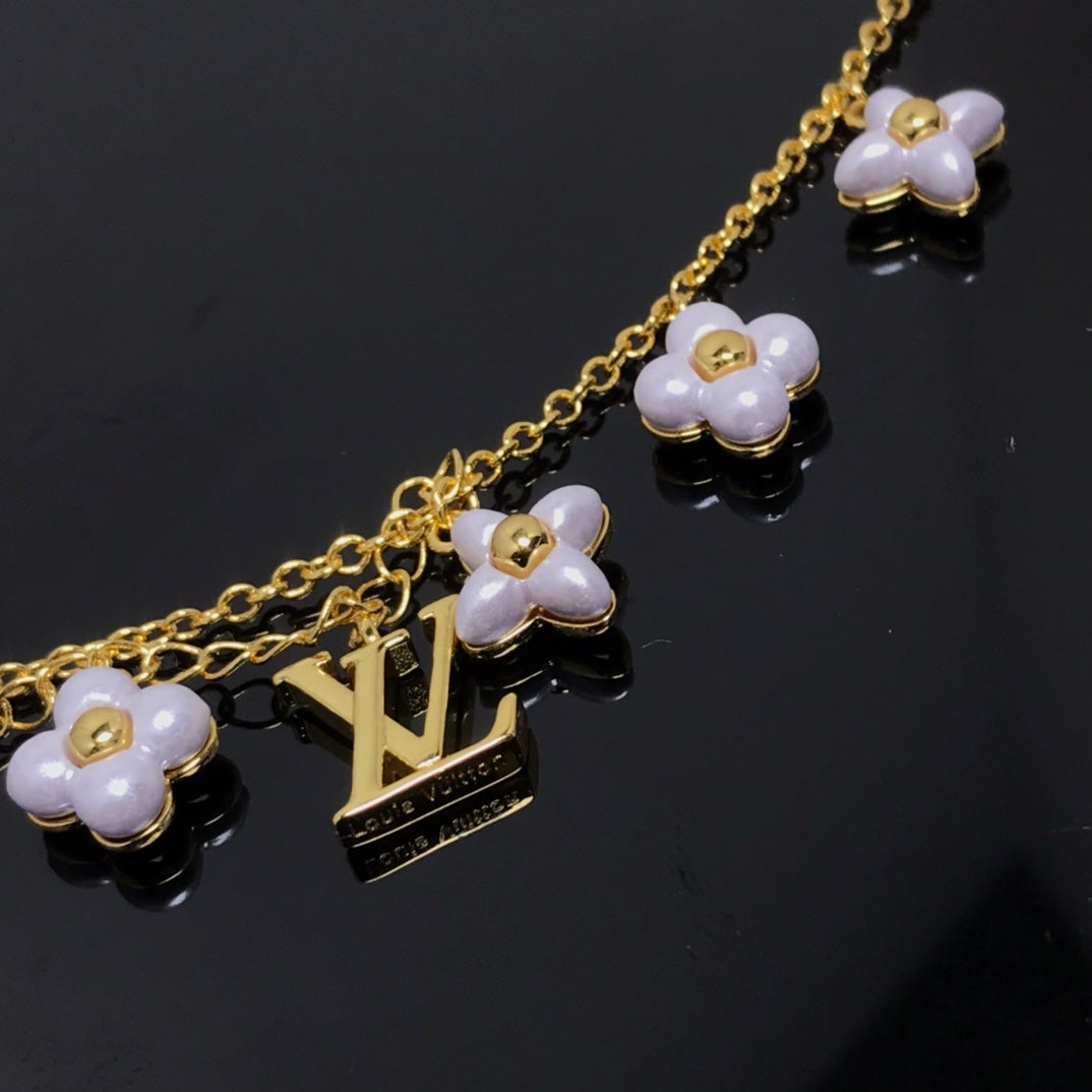 [AM]LOGO 6 MOTIF STAR AND SUN GOLD BRACELET