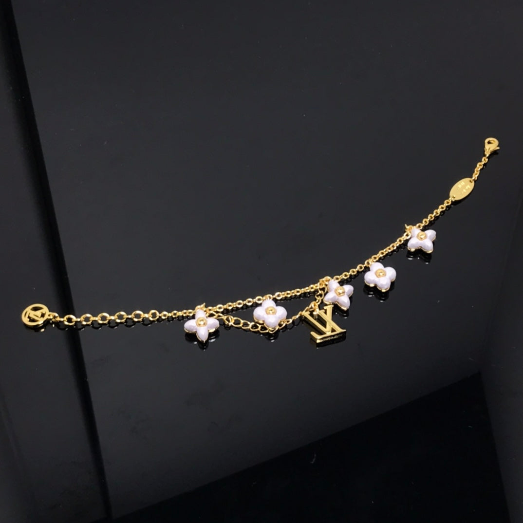 [AM]LOGO 6 MOTIF STAR AND SUN GOLD BRACELET