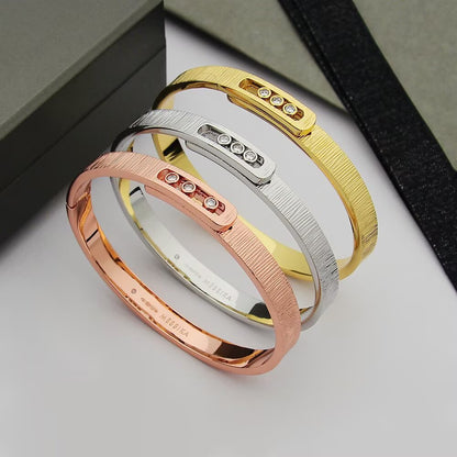 [AM]MOVE NOA CISELÉ BANGLE BRACELET