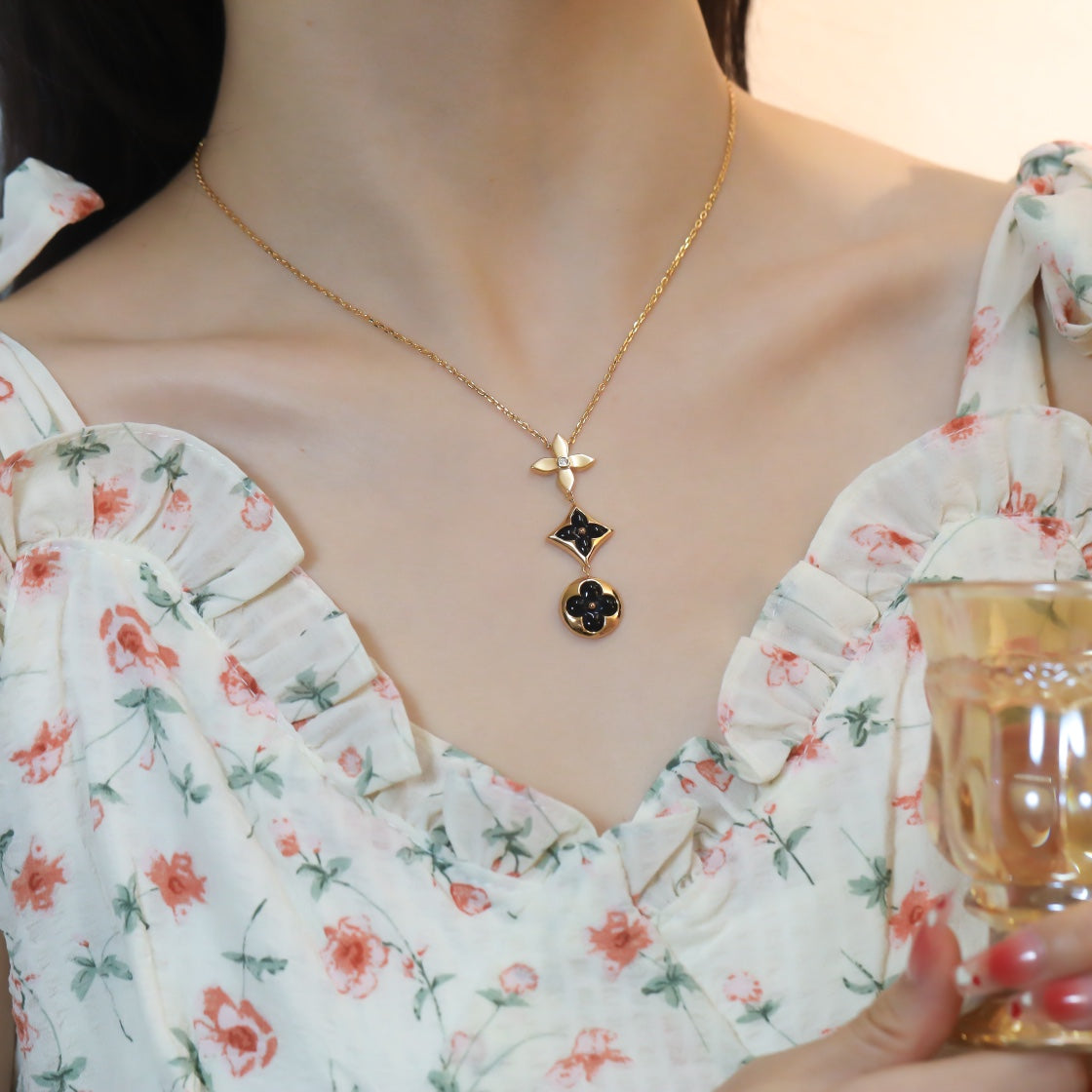 [AM]STAR AND SUN ONYX ROSE GOLD NECKLACE