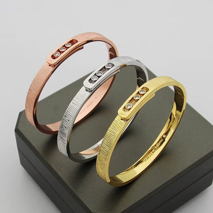 [AM]MOVE NOA CISELÉ BANGLE BRACELET