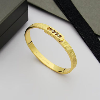 [AM]MOVE NOA CISELÉ BANGLE BRACELET