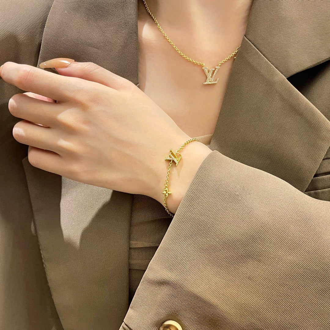[AM]LOGO STAR MOTIF GOLD BRACELET
