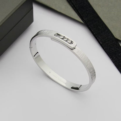 [AM]MOVE NOA CISELÉ BANGLE BRACELET