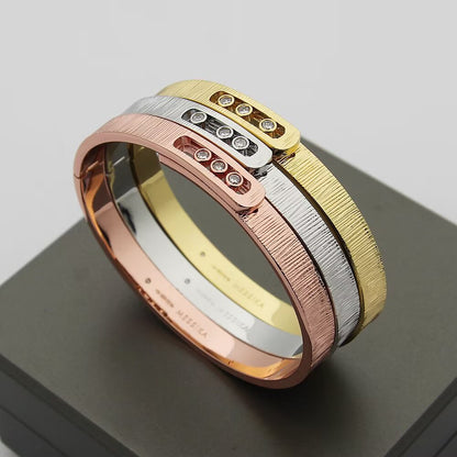 [AM]MOVE NOA CISELÉ BANGLE BRACELET