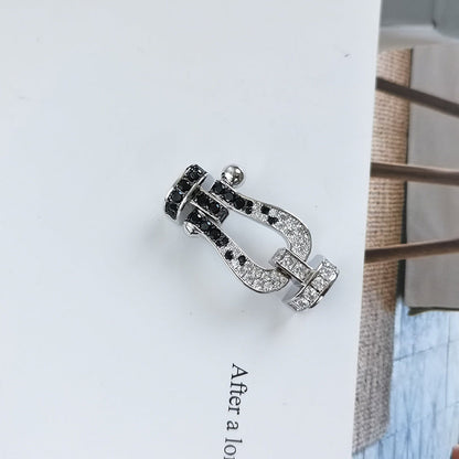 [AM]FORCE LARGE HORSESHOE BLACK & WHITE DIAMOND BRACELET - WHITE GOLD