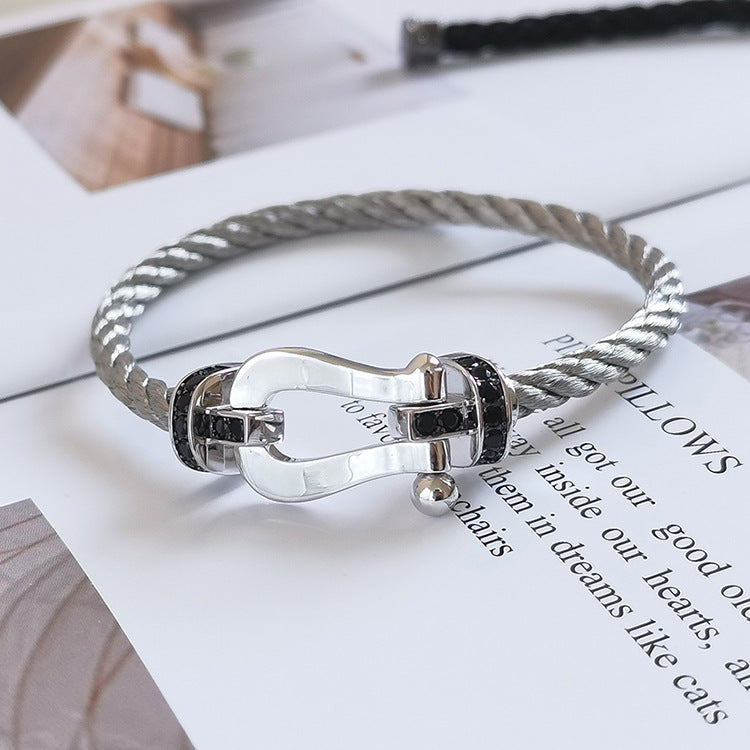 [AM]FORCE LARGE HORSESHOE BLACK DIAMOND BRACELET - WHITE GOLD