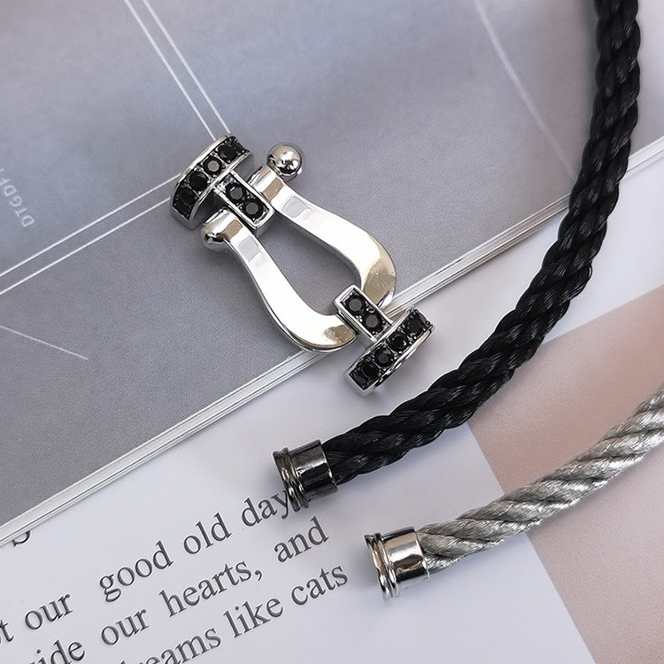 [AM]FORCE LARGE HORSESHOE BLACK DIAMOND BRACELET - WHITE GOLD