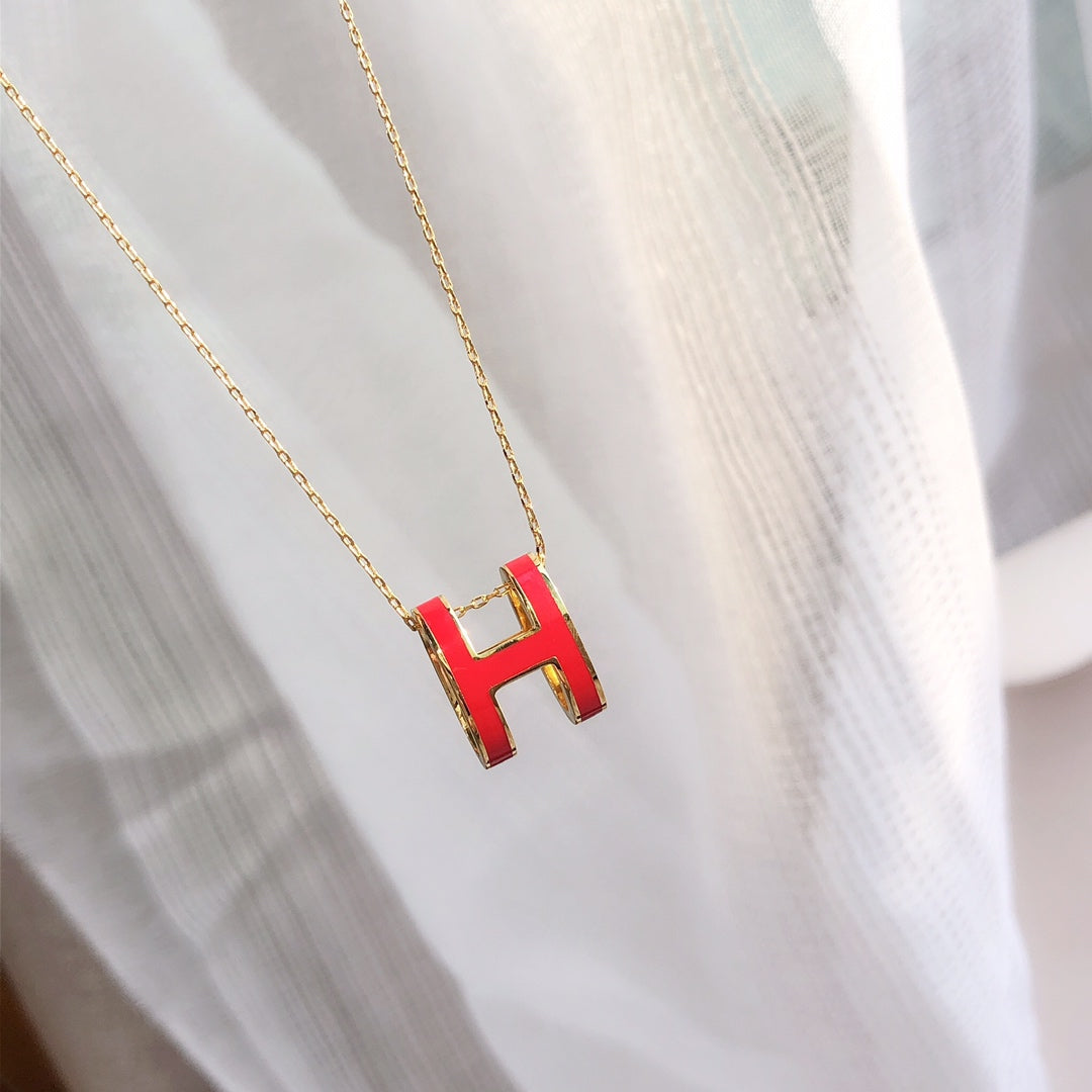 [AM]HM CLIC RED ENAMEL GOLD NECKLACE