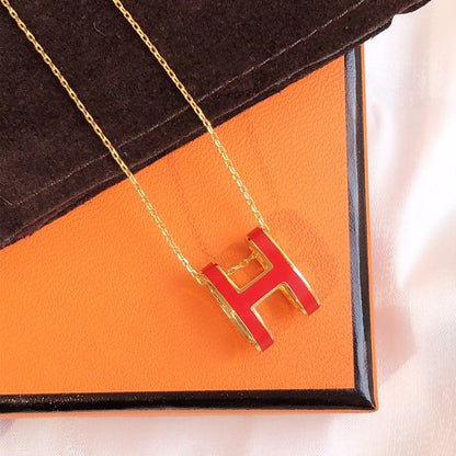 [AM]HM CLIC RED ENAMEL GOLD NECKLACE