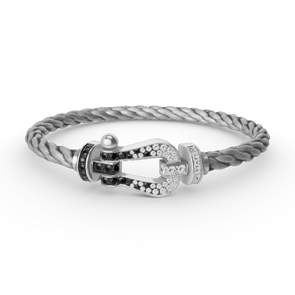 [AM]FORCE LARGE HORSESHOE BLACK & WHITE DIAMOND BRACELET - WHITE GOLD